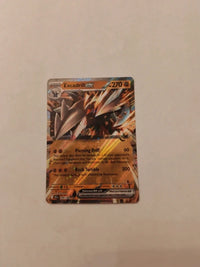Excadrill ex 046/086 | Moderately to heavily played actual card photograph