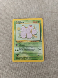 Exeggcute 52/64 | Moderately to heavily played actual card photograph