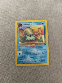 Omanyte 52/62 | Moderately to heavily played actual card photograph