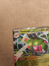 Yanmega ex 003/182 English, actual card front upper-left detail