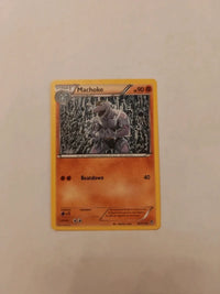 Machoke 45/111 | Moderately to heavily played actual card photograph