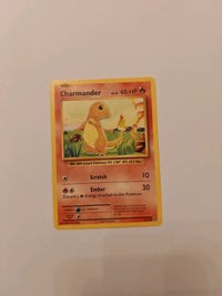 Charmander 9/108 | Moderately to heavily played actual card photograph